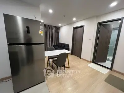 Modern apartment interior with sleek kitchen and cozy living area