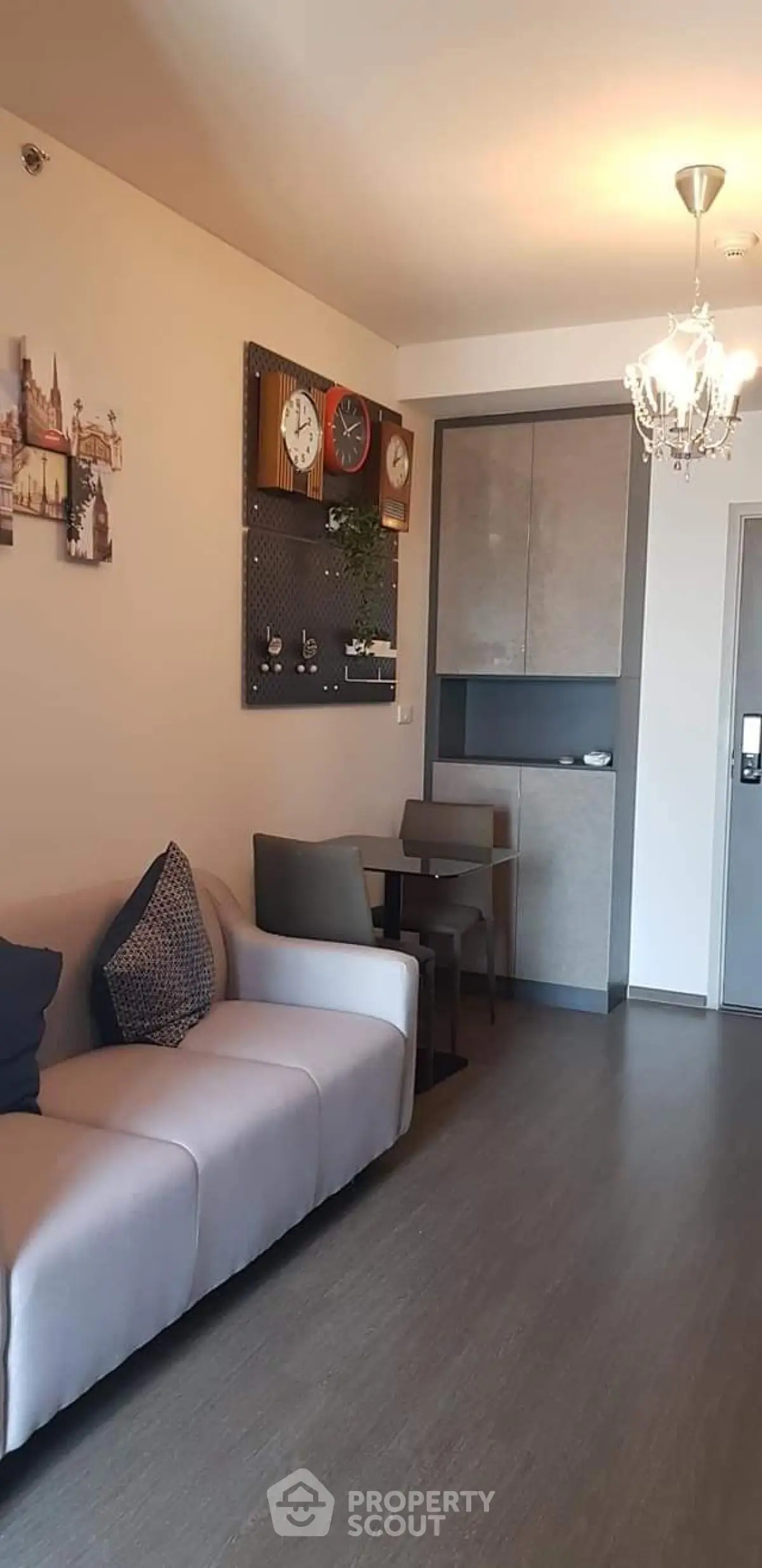 Modern living room with stylish decor and cozy seating area in a contemporary apartment.