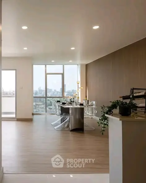 Spacious modern dining area with city view and elegant decor