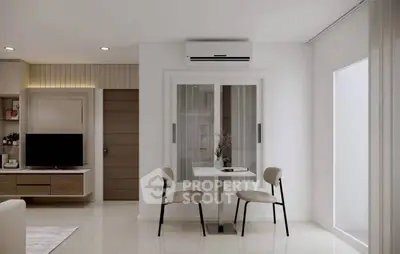 Modern living room with sleek furniture and air conditioning, featuring a cozy dining area.