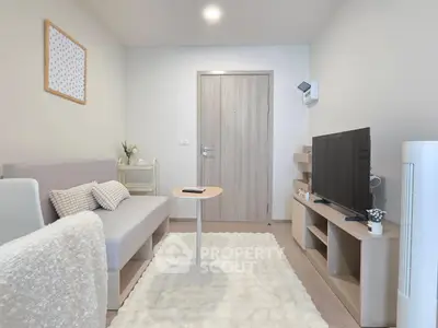 Cozy modern living room with stylish decor and entertainment setup
