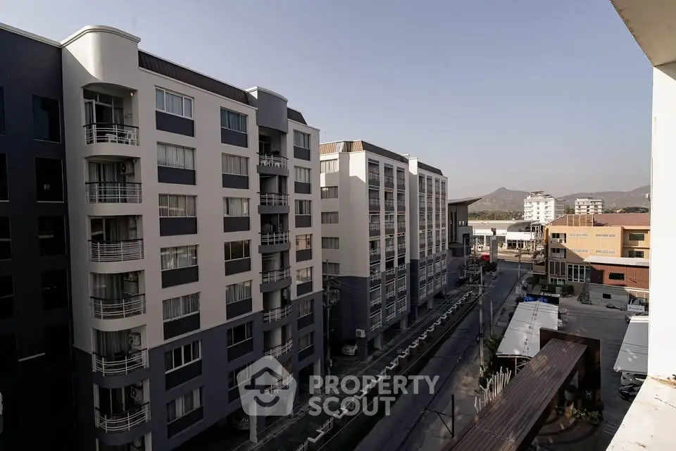 Modern urban apartment buildings with mountain views