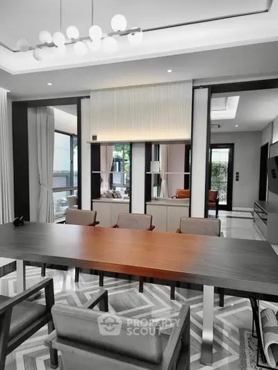 Luxurious modern dining room with elegant lighting and stylish decor