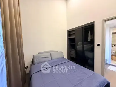 Cozy bedroom with modern built-in wardrobe and soft lighting