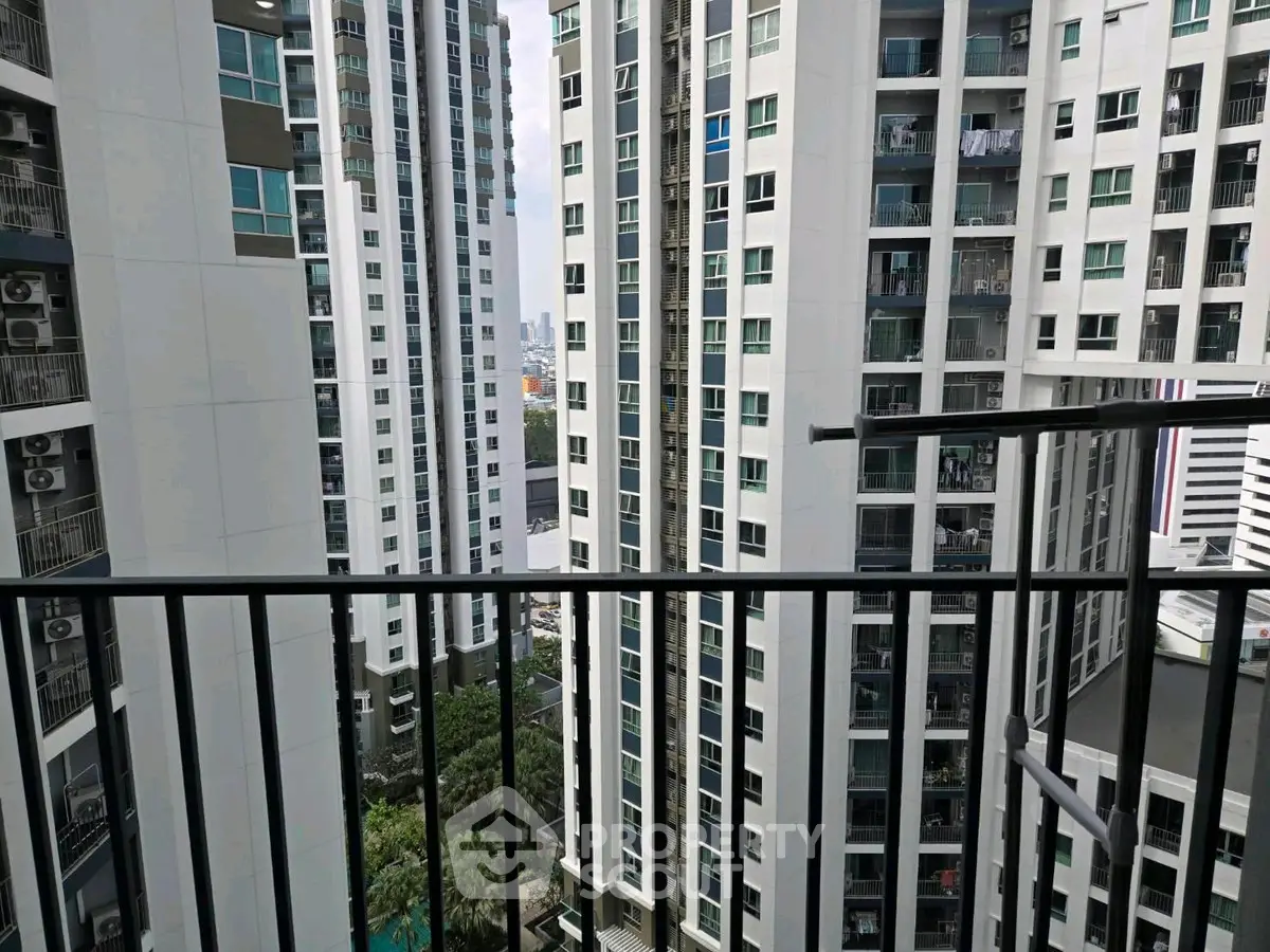 High-rise apartment buildings with city view from balcony