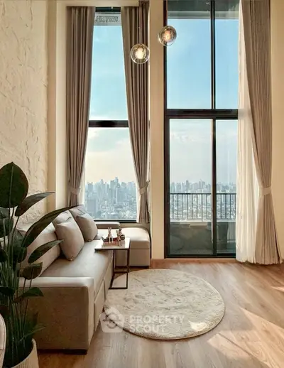 Luxurious living room with floor-to-ceiling windows and stunning city view