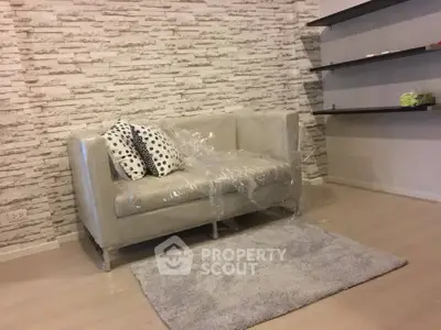 Modern living room with stylish sofa and decorative shelves