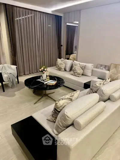 Elegant modern living room with stylish furniture and chic decor