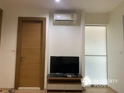 Modern living room with air conditioning and TV setup