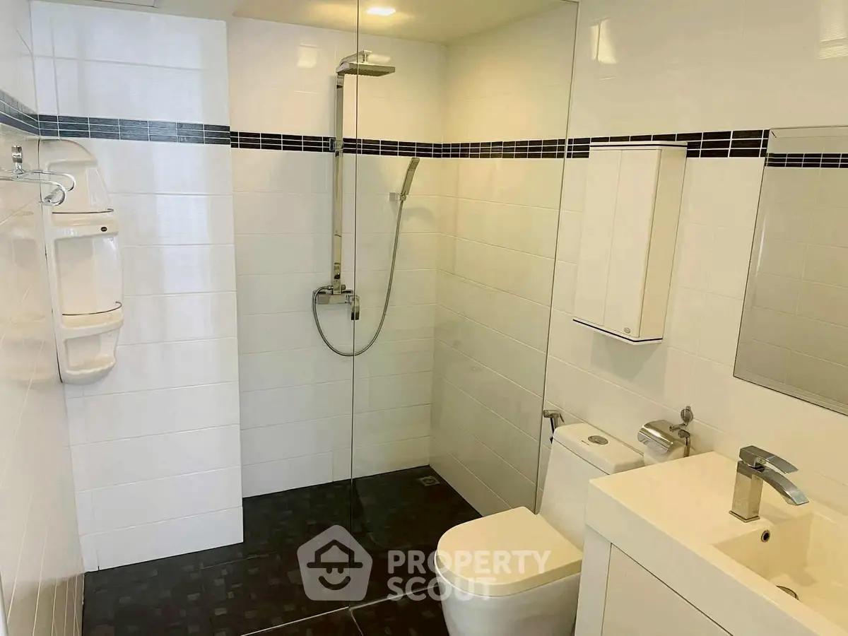 Modern bathroom with sleek shower and contemporary fixtures