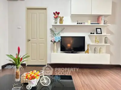 Stylish living room with modern decor and sleek wooden flooring