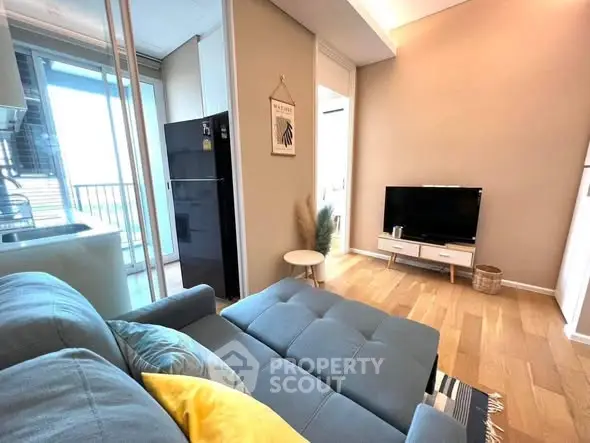 Modern living room with balcony access and stylish decor