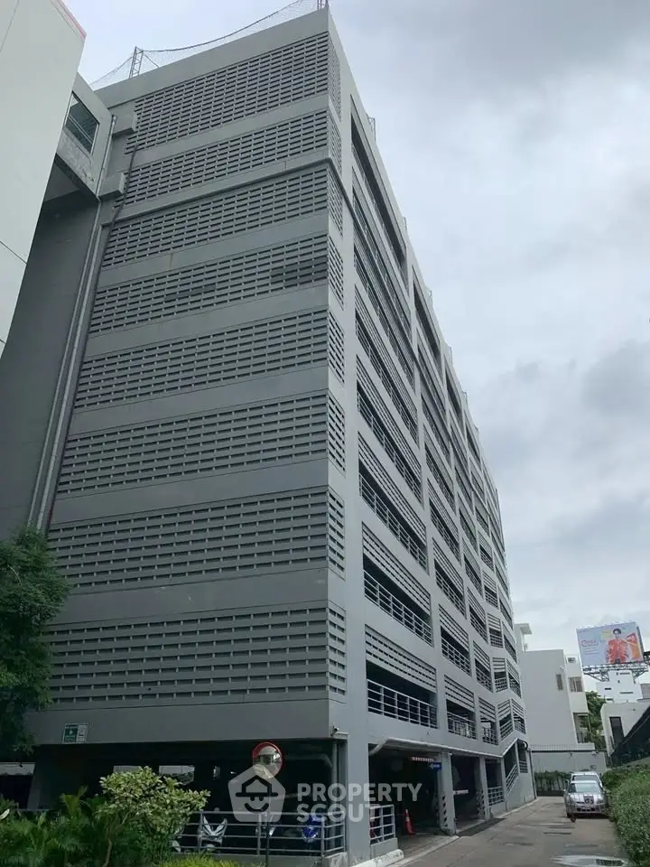 Modern multi-story building with sleek architectural design and urban appeal.