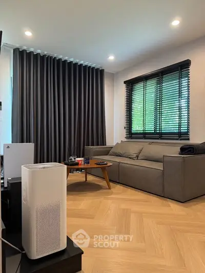 Modern living room with sleek furniture and stylish decor