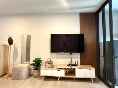 Modern living room with sleek TV setup and stylish decor