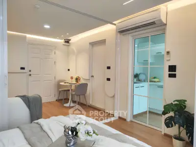 Modern apartment interior with cozy living area and stylish kitchen