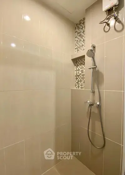 Modern bathroom with sleek shower design and elegant tile work