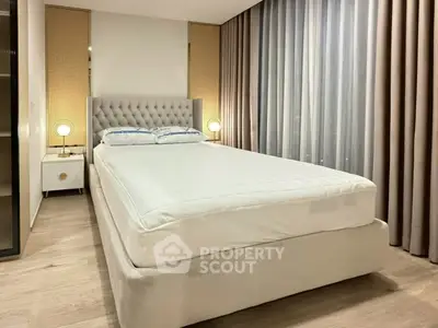 Luxurious bedroom with elegant decor and plush bed in modern apartment