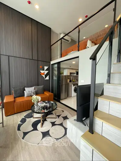 Modern loft apartment with stylish living area and mezzanine bedroom