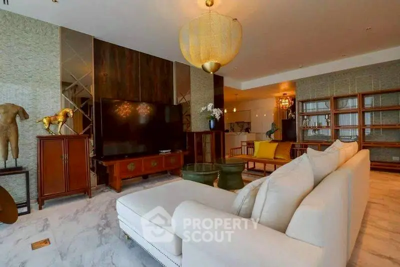 Luxurious living room with elegant decor and spacious seating area.