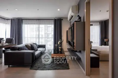 Modern living room with sleek design, open layout, and stylish furniture in a contemporary apartment.