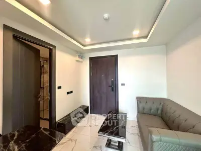 Modern living room with sleek marble tables and stylish sofa