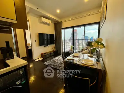 Modern living room with city view, stylish decor, and dining area in a high-rise apartment.