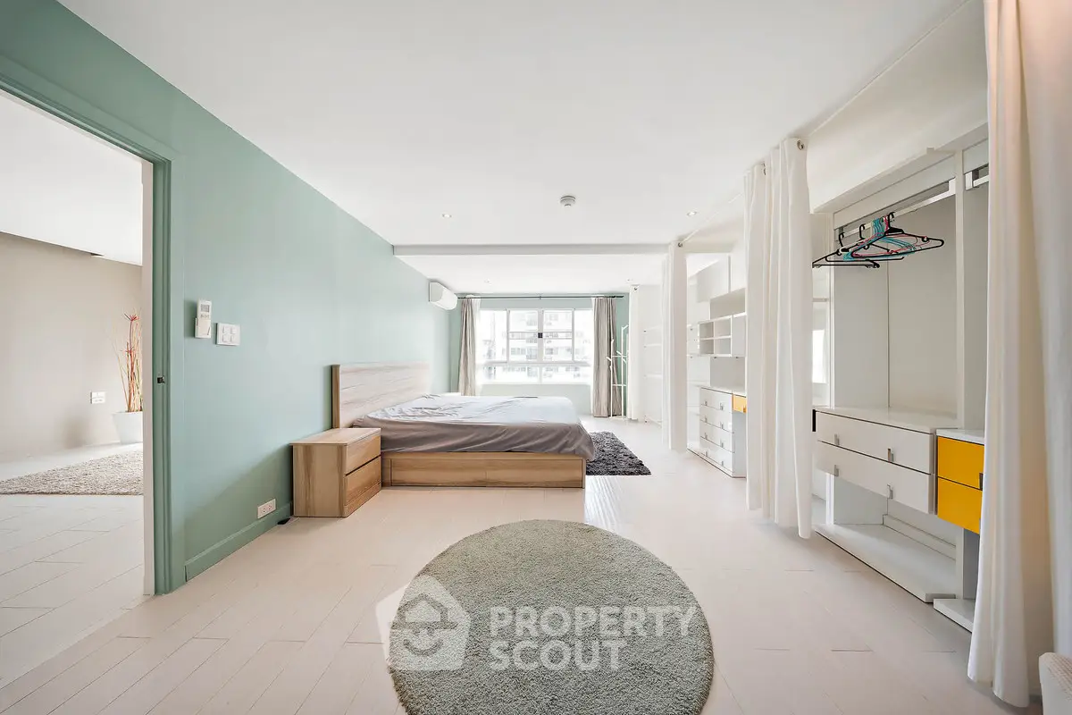 Spacious modern bedroom with open layout and stylish decor