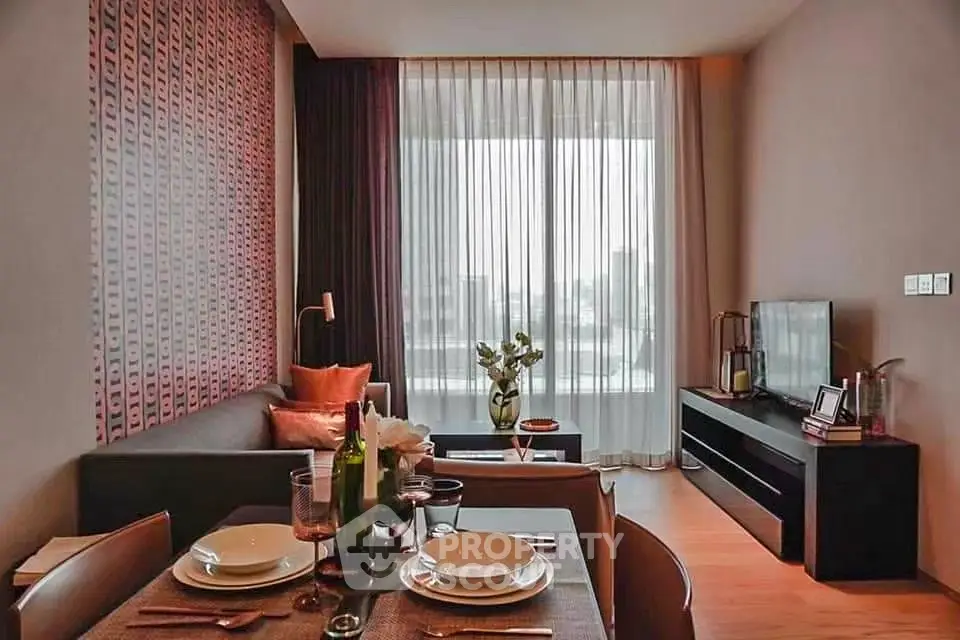 Stylish modern living room with elegant decor and large window view