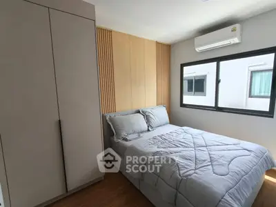 Modern bedroom with sleek design and natural light
