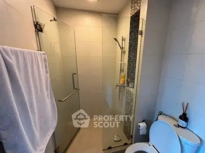 Modern bathroom with glass shower and sleek design