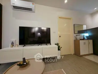Modern living room with sleek TV setup and stylish decor