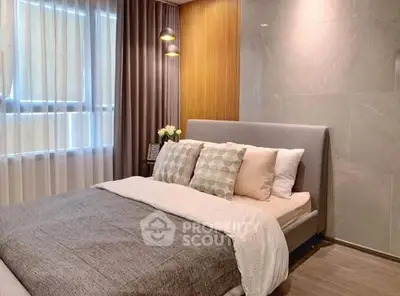 Elegant bedroom with modern decor and cozy ambiance