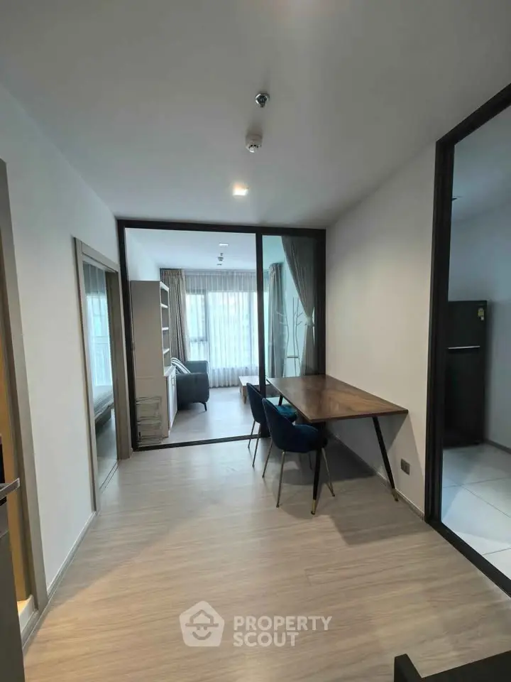 Modern apartment interior with stylish dining area and cozy living room