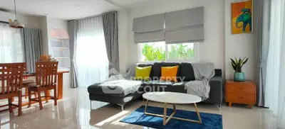Bright and modern living room with stylish decor and natural light