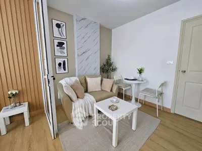 Charming living room with cozy sofa and modern decor in stylish apartment.