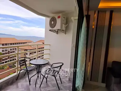 Stunning balcony with ocean view in modern apartment, perfect for relaxation and enjoying the scenery.