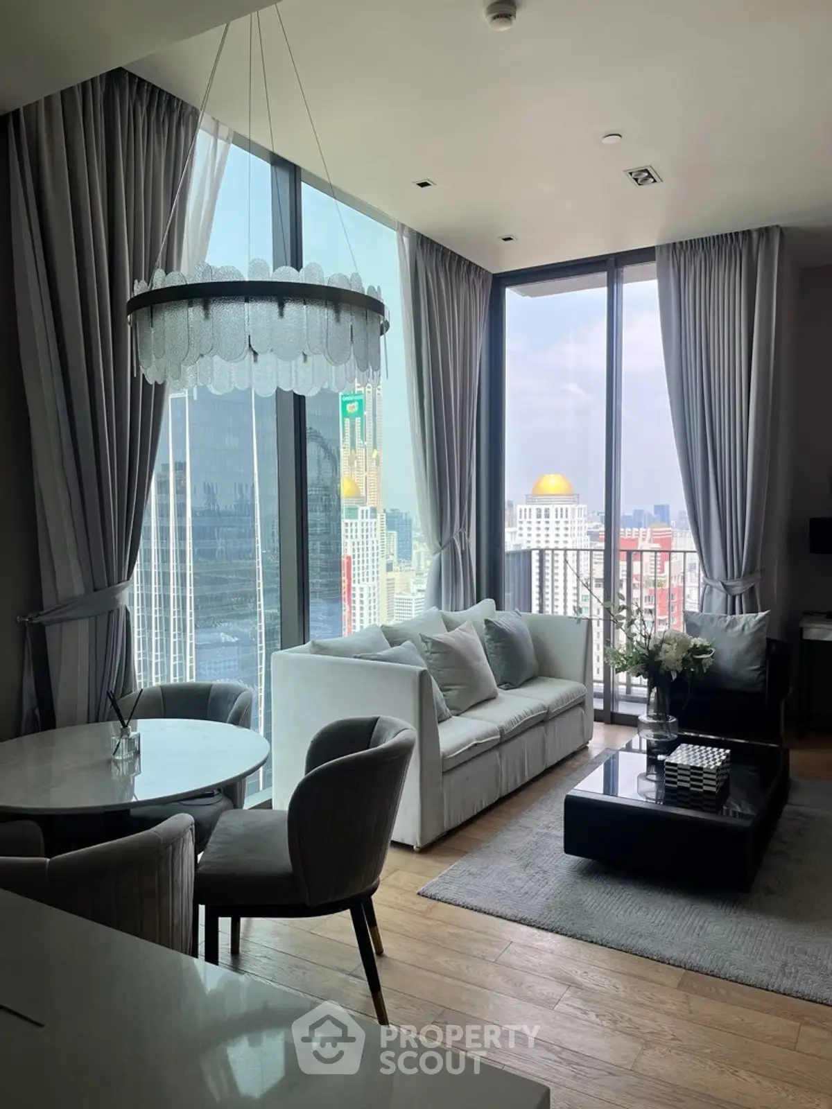 Luxurious high-rise living room with stunning city view and elegant decor