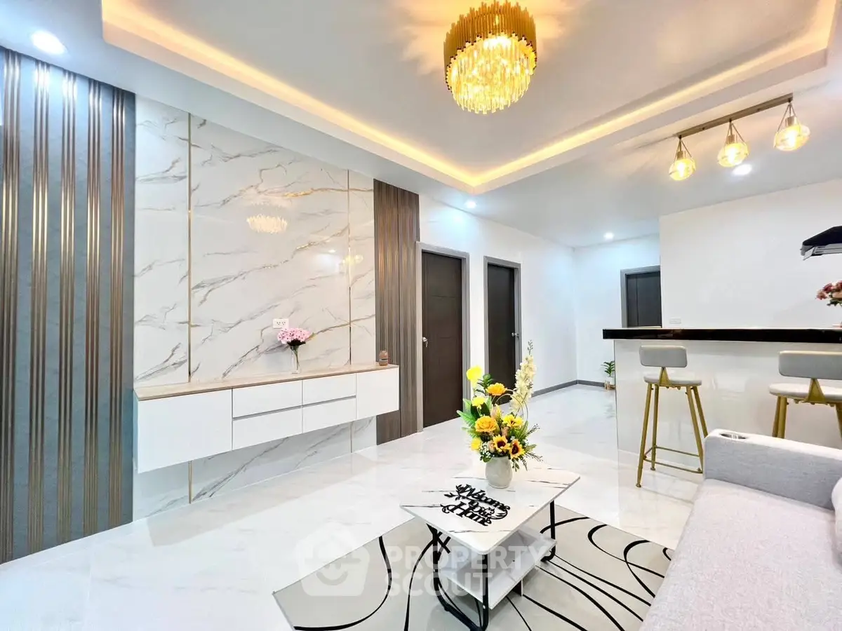 Luxurious modern living room with elegant lighting and stylish decor