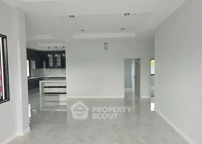 Spacious modern interior with open layout and sleek design, perfect for contemporary living.