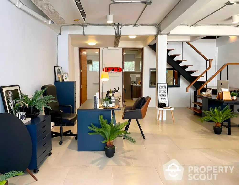 Chic urban loft with open floor plan, modern furniture, and industrial design elements, perfect for a trendy lifestyle.