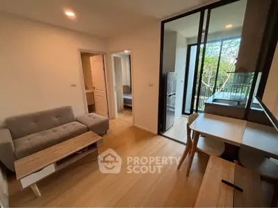Modern living room with cozy sofa and balcony view in stylish apartment