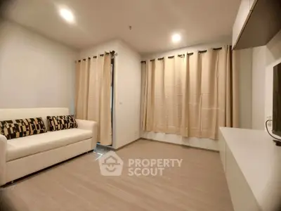 Spacious modern living room with elegant curtains and sleek flooring