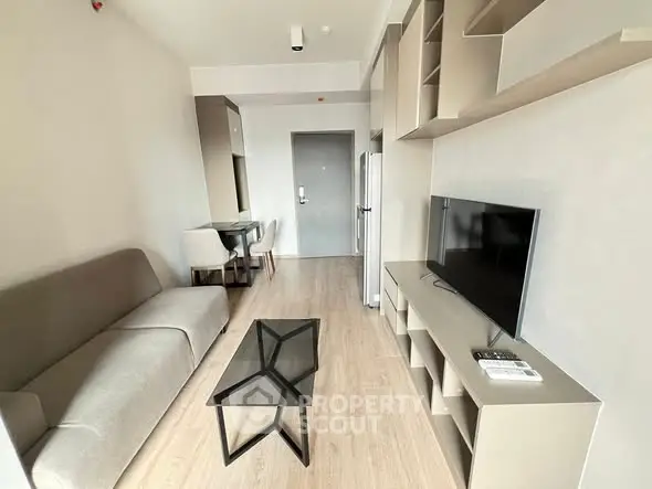 Modern minimalist living room with sleek furniture and neutral tones