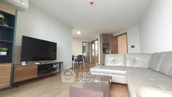 Spacious modern living room with sleek furniture and open layout