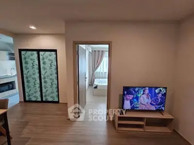 Modern apartment interior with open kitchen and cozy living area