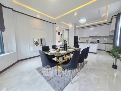 Luxurious dining room with elegant decor and modern kitchen in open layout