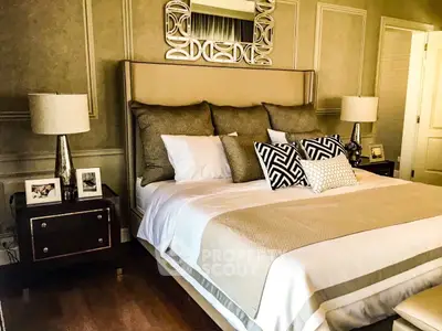 Luxurious bedroom with elegant decor and plush bedding