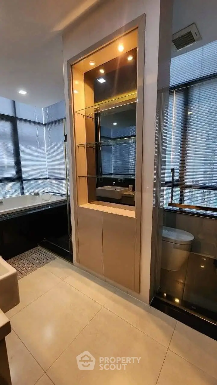 Luxurious modern bathroom with city view and elegant fixtures