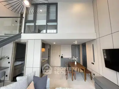 Modern duplex apartment with open living area and stylish decor